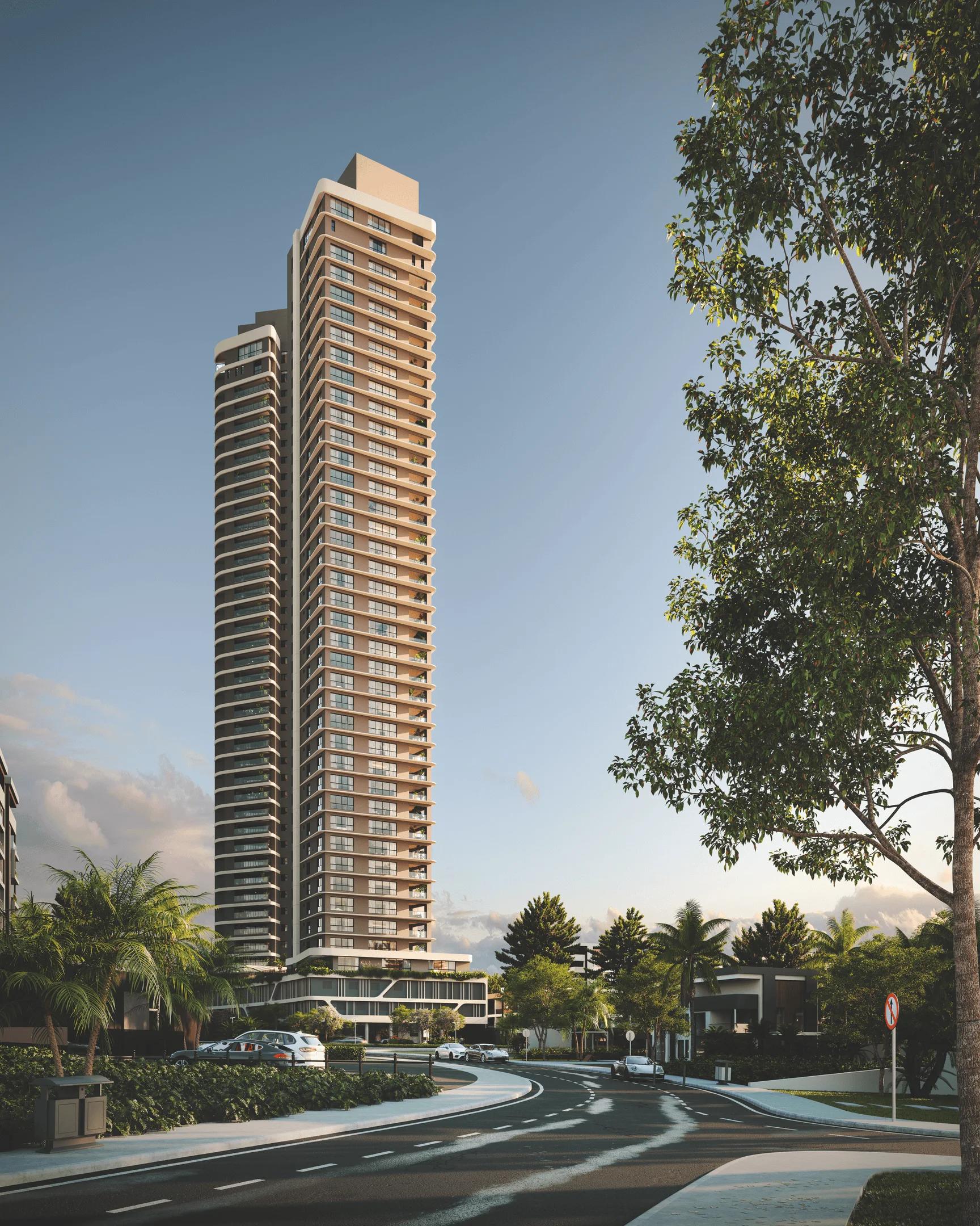 Vista da torre residencial a partir da rua com árvores em primeiro plano