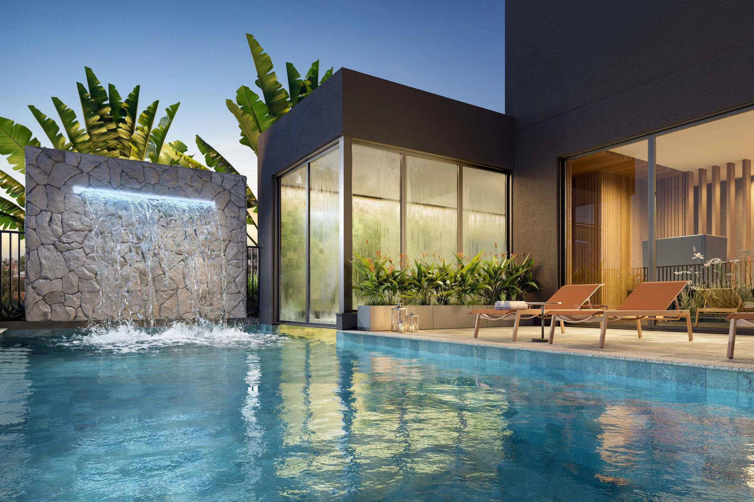 Piscina com cascata e deck