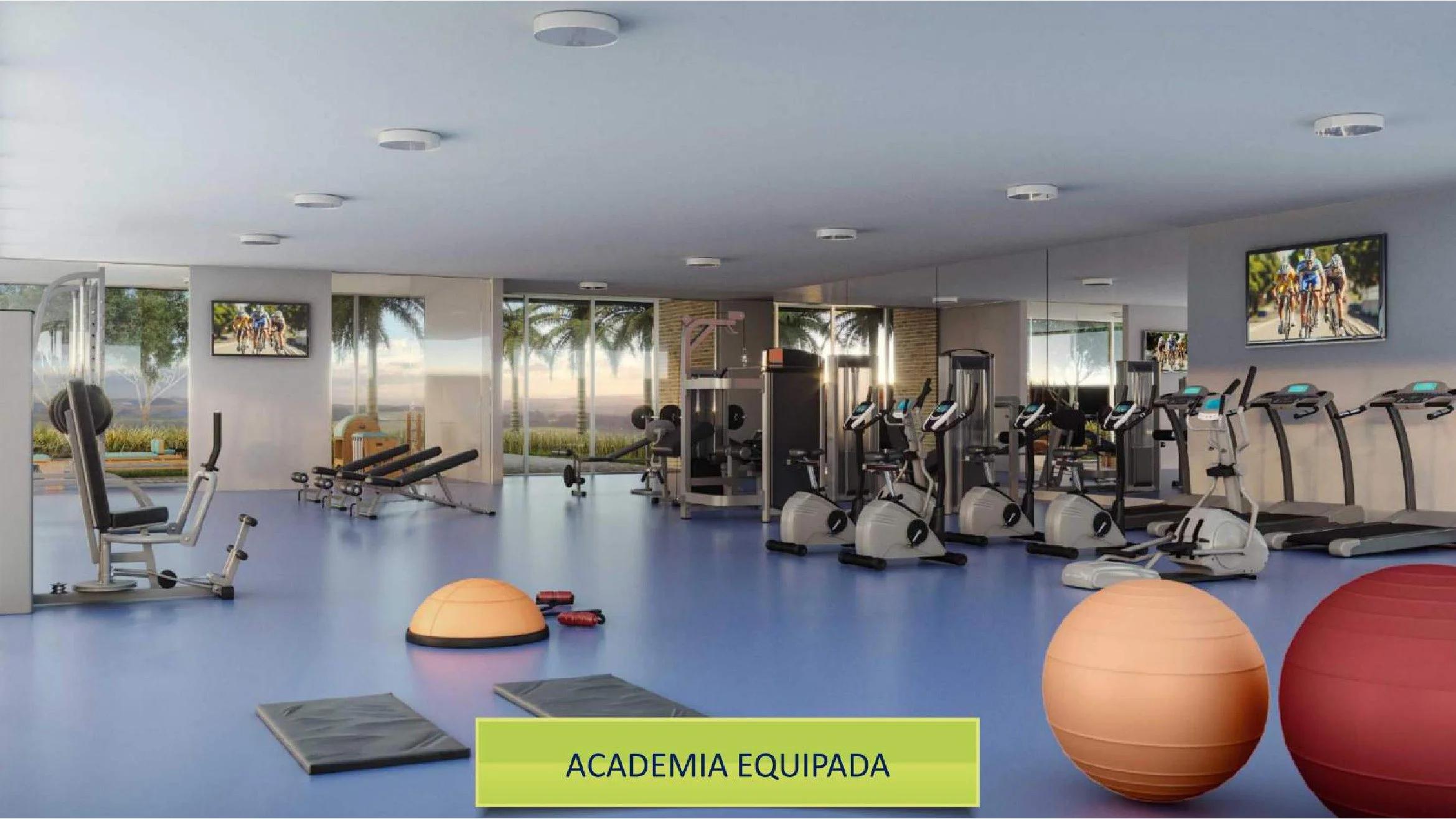 Academia equipada com esteiras, bicicletas ergométricas e aparelhos de musculação