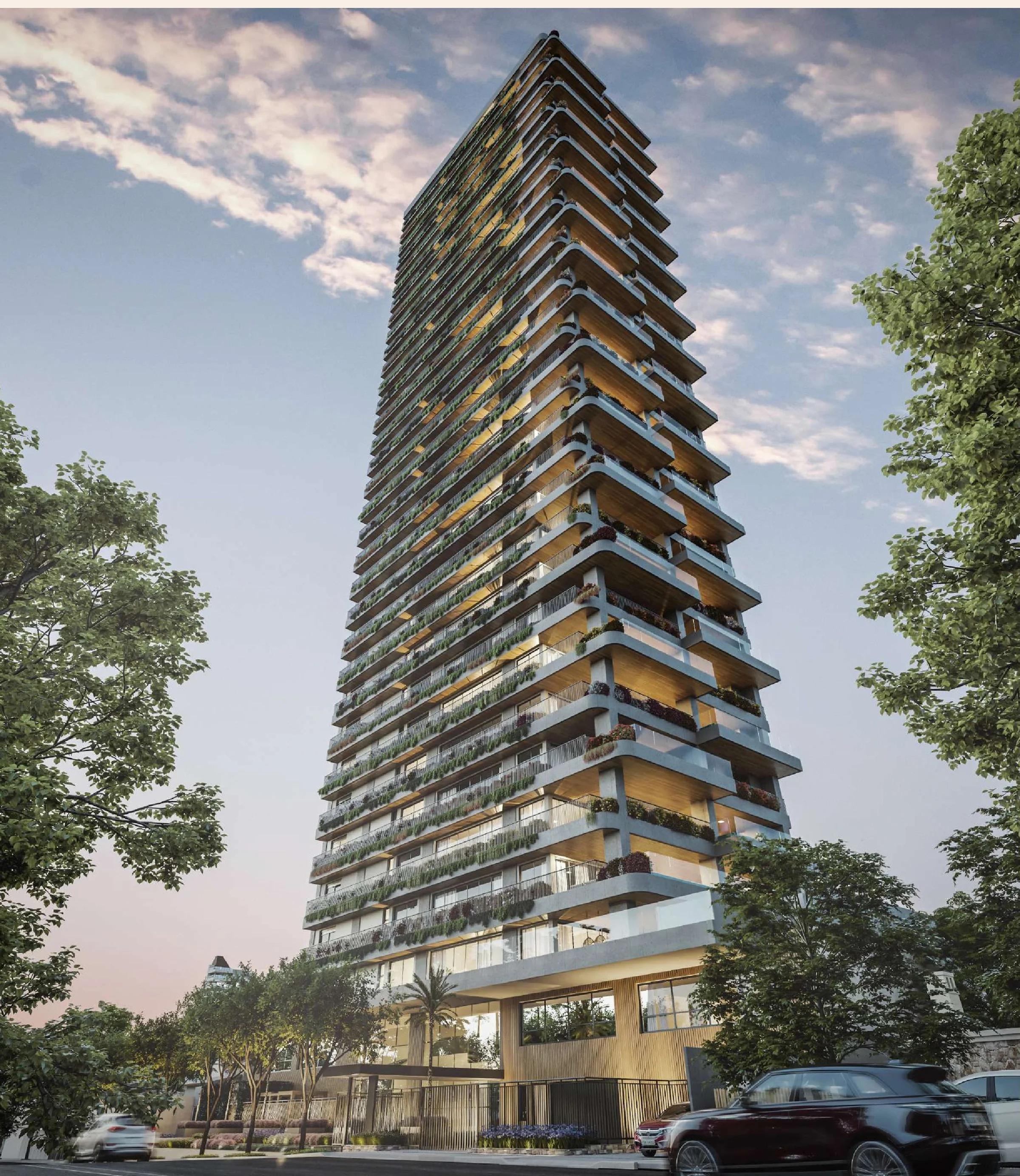 Perspectiva da fachada da torre residencial ao entardecer com iluminação interna
