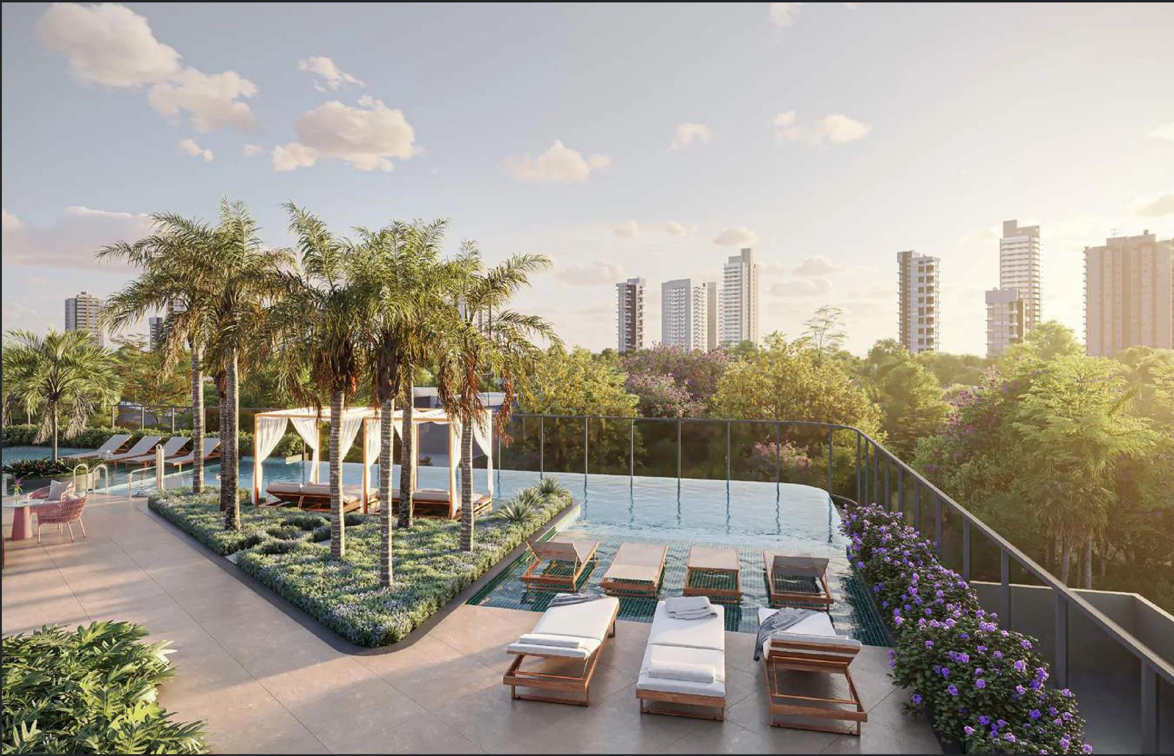 Vista superior da área da piscina com deck, espreguiçadeiras, cabana e paisagismo