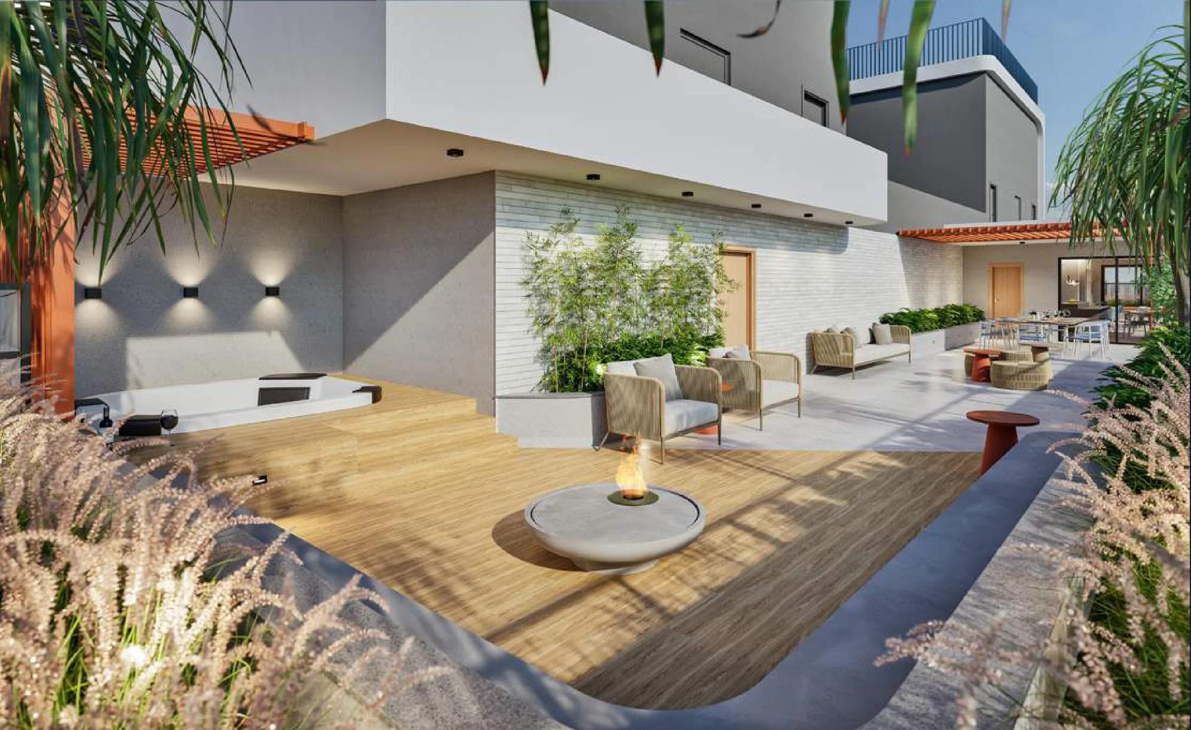 Terraço descoberto com lareira ao ar livre, deck e banheira de hidromassagem