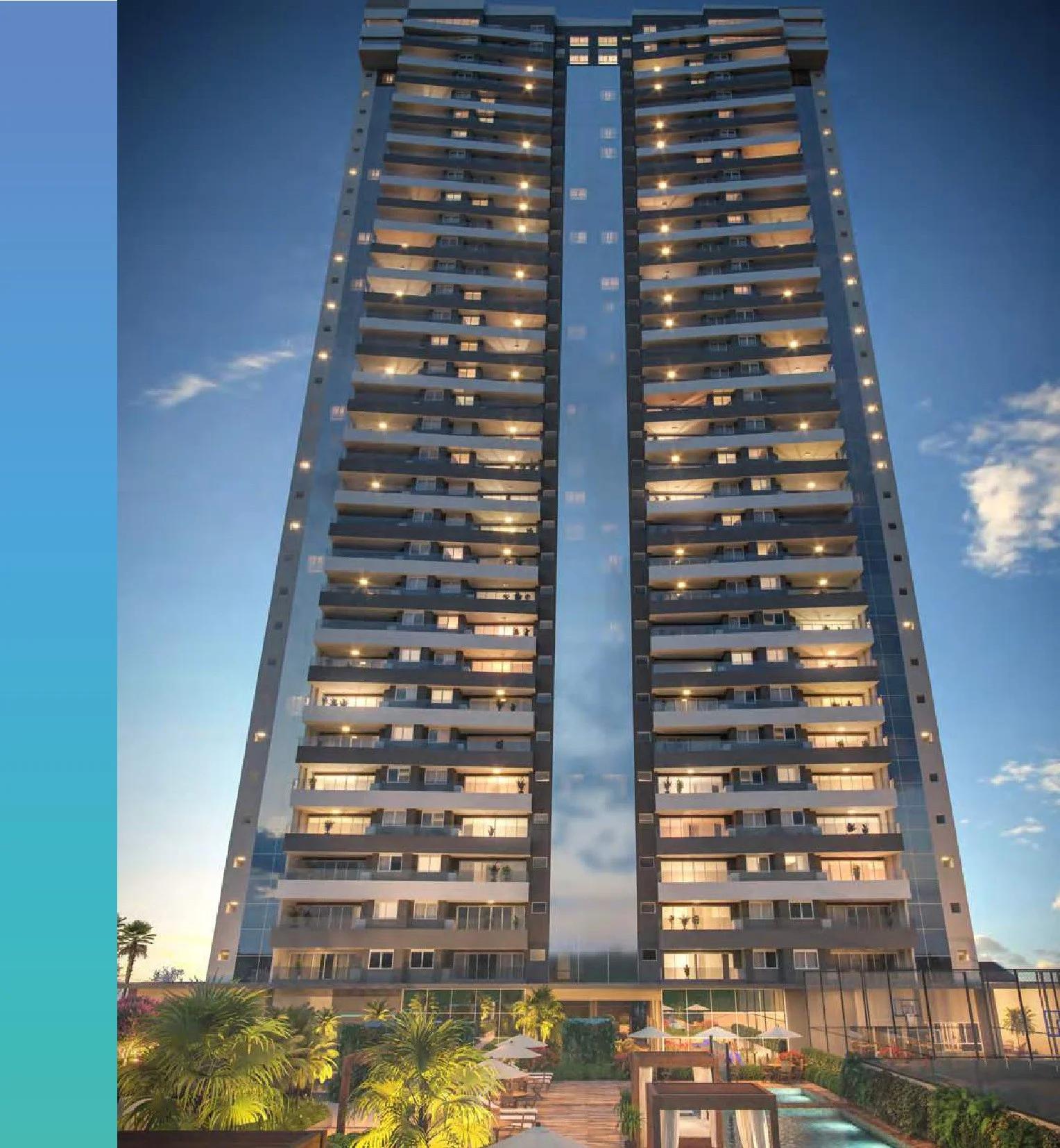 Fachada vertical da torre residencial iluminada ao anoitecer