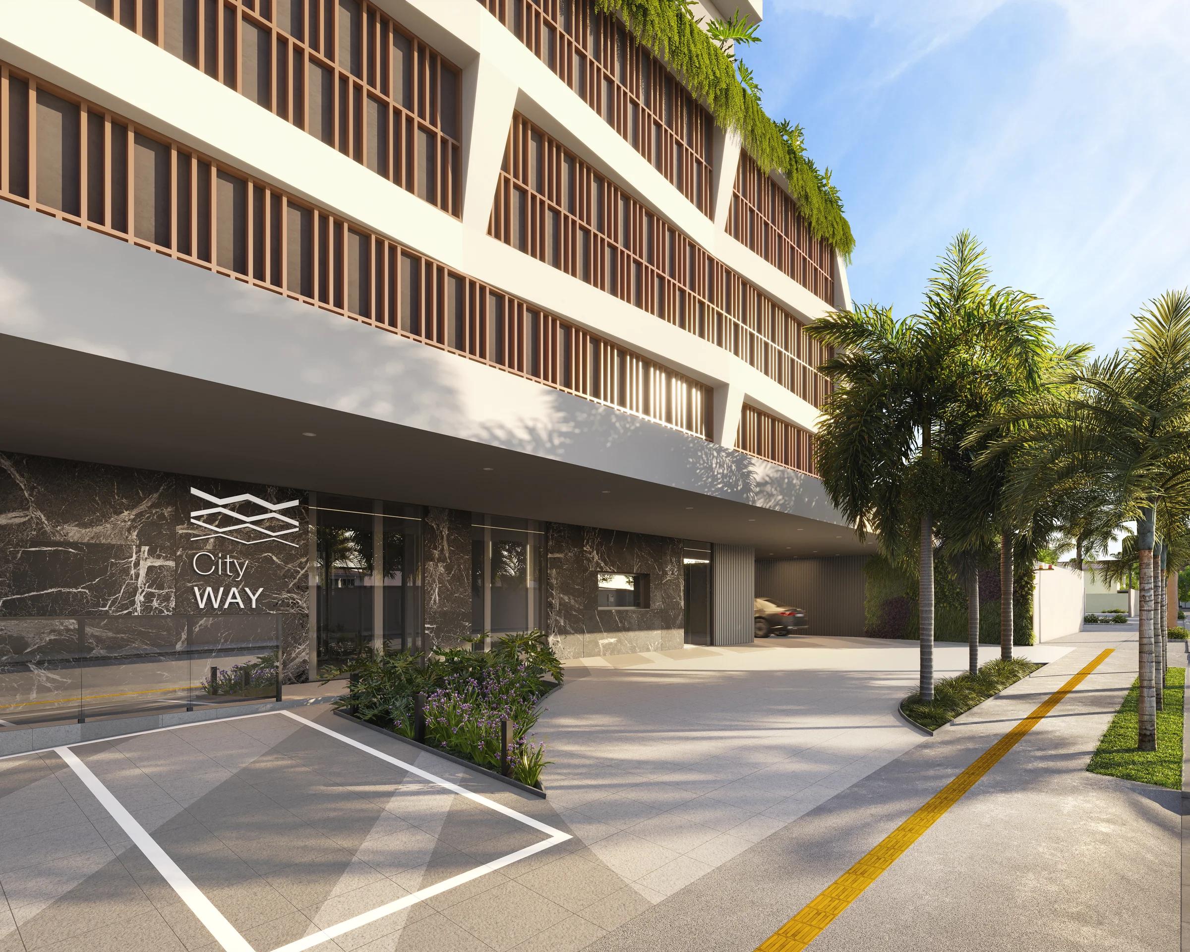 Acesso social e entrada do edifício com porte-cochère, acabamento em mármore escuro e palmeiras