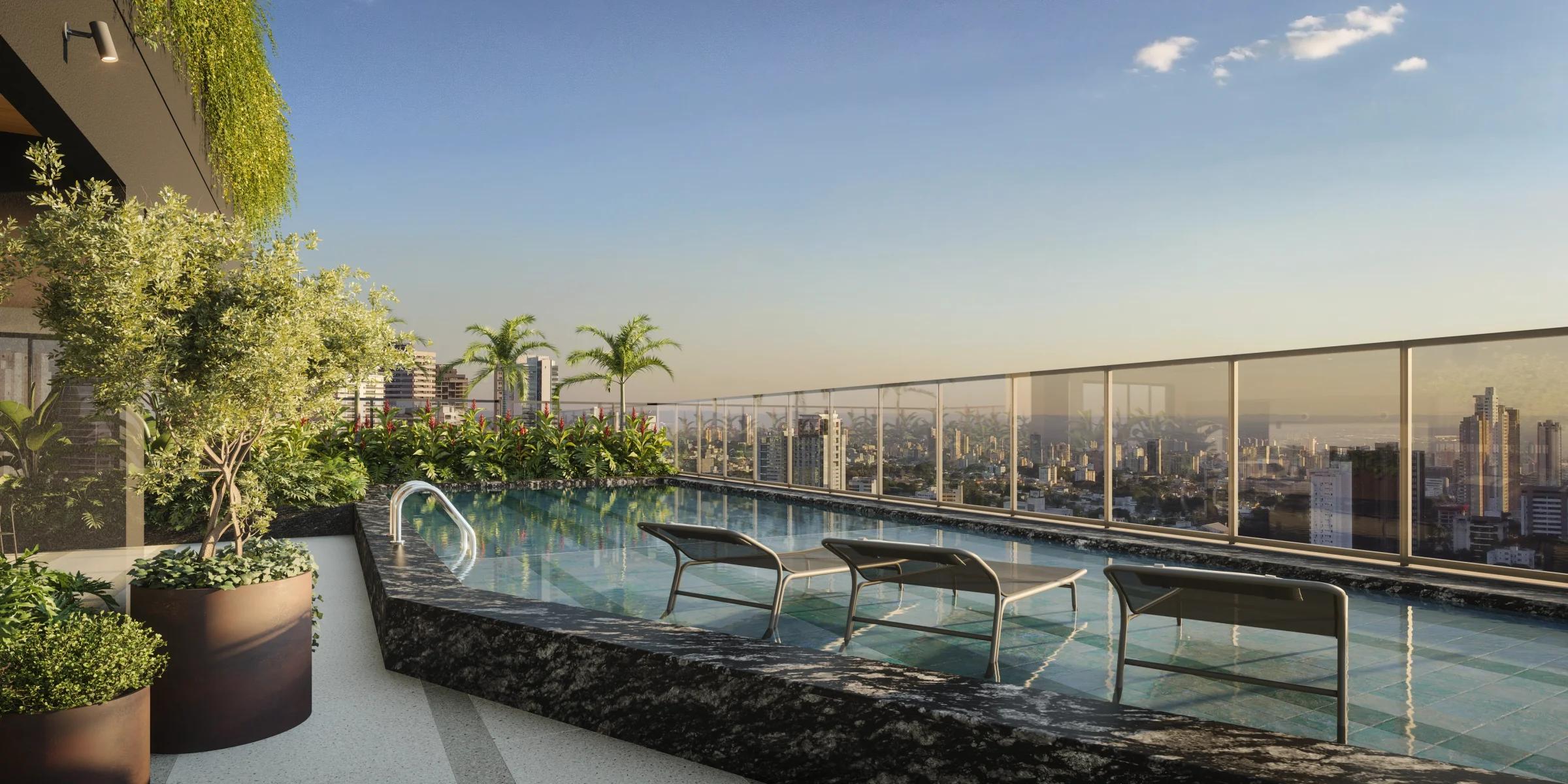 Piscina no rooftop com guarda-corpo de vidro e espreguiçadeiras com vista para a cidade