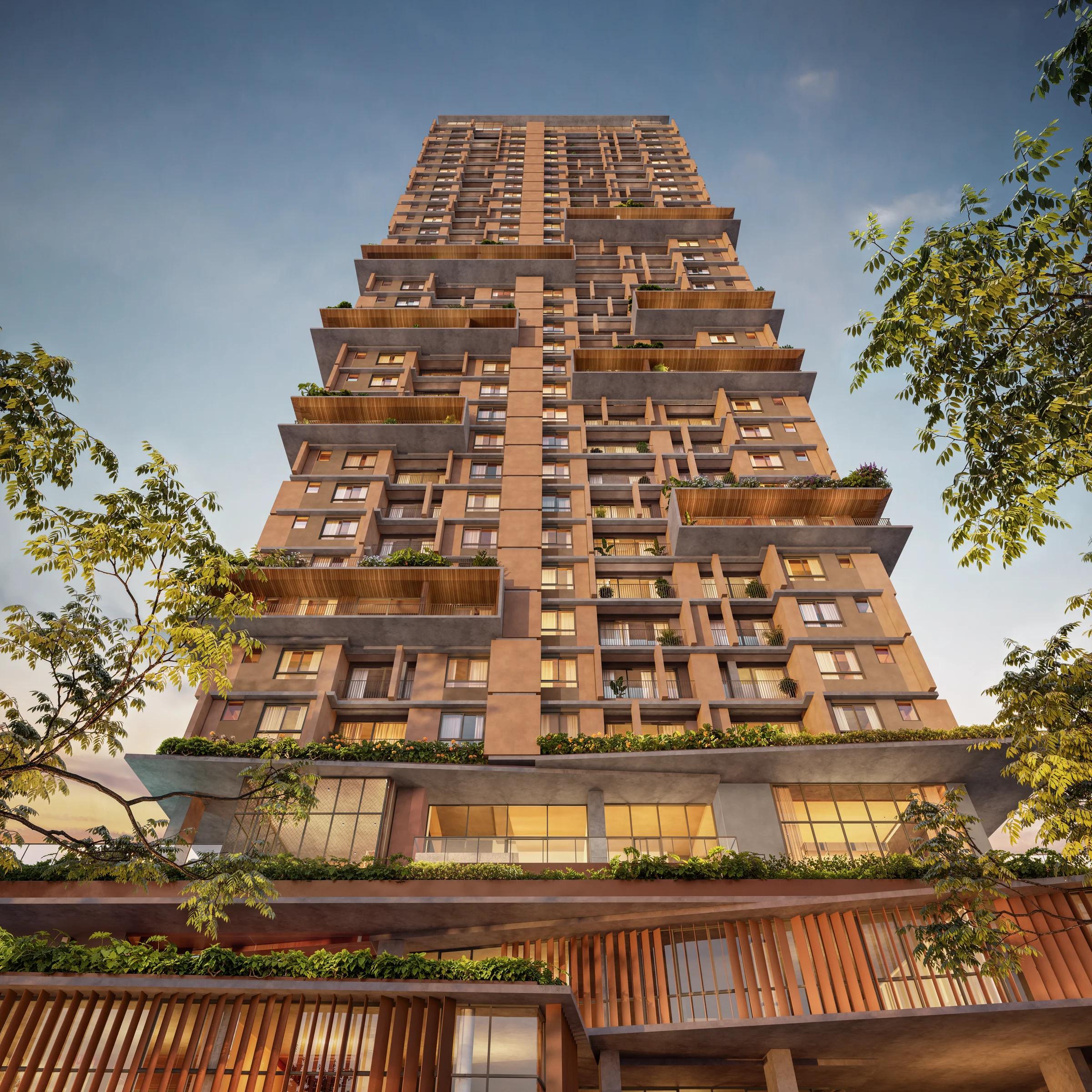Torre residencial vista de baixo para cima, com varandas e paisagismo.