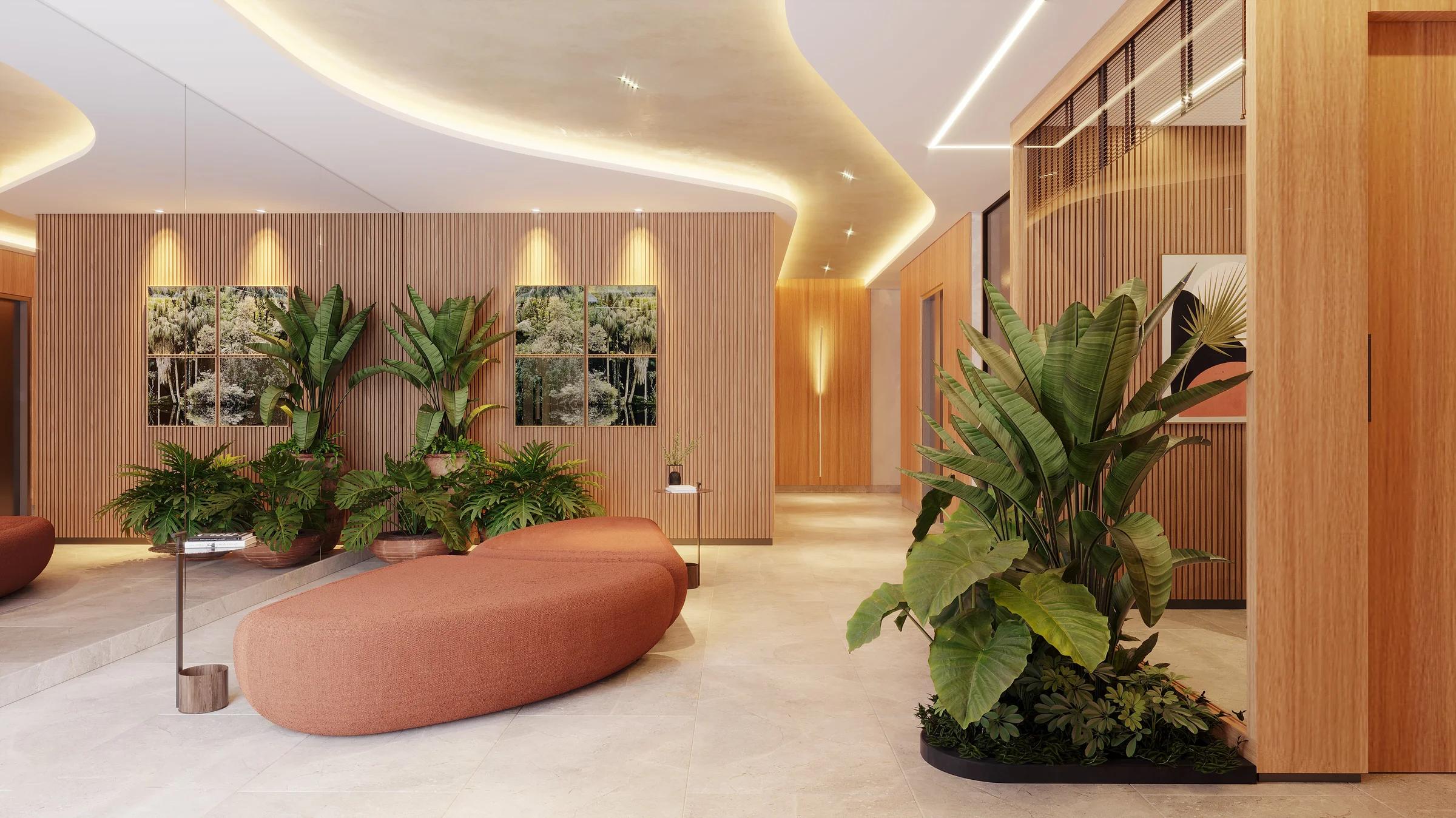 Perspectiva do lobby com área de estar e jardim interno