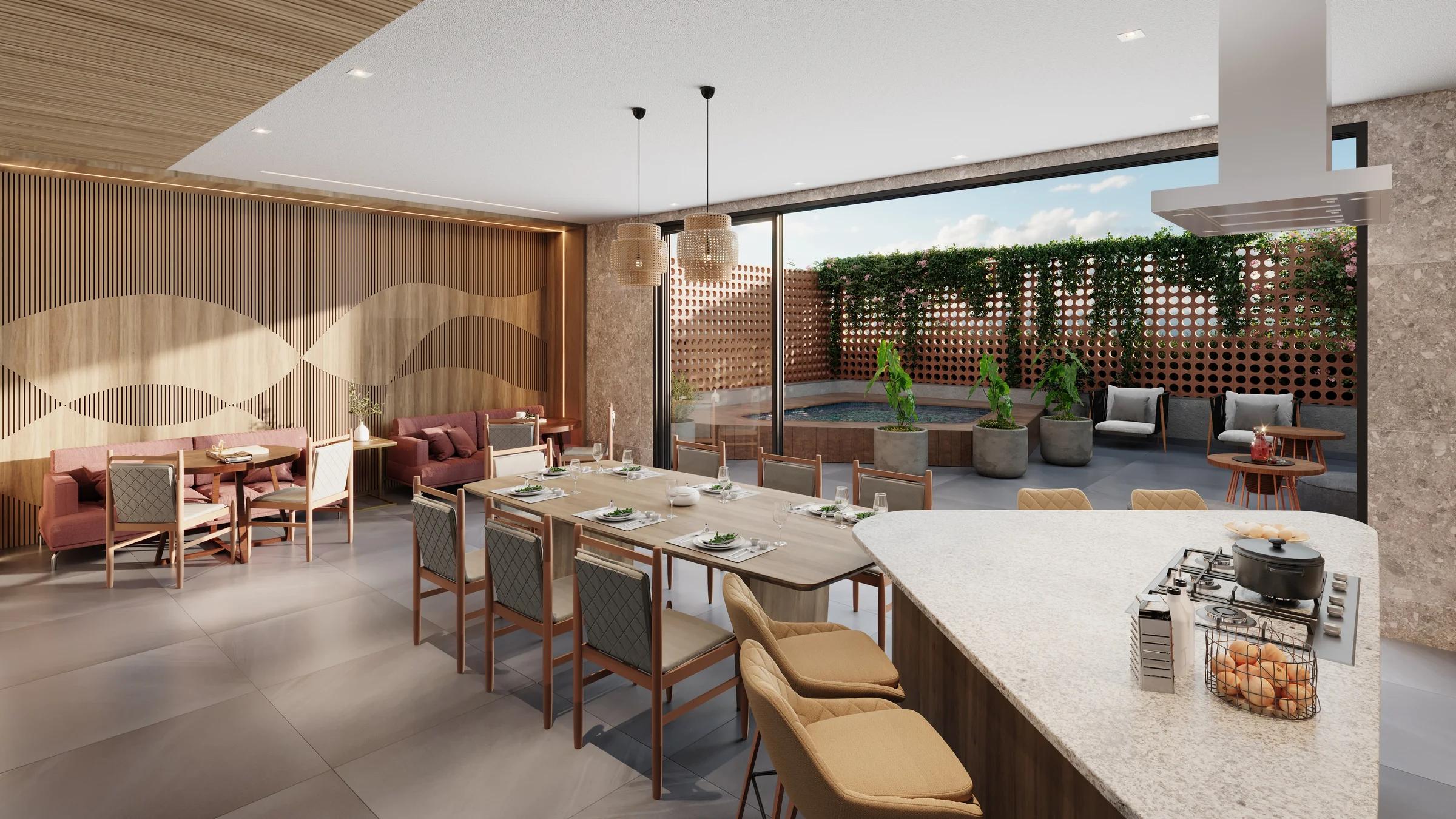 Espaço gourmet com bancada com cooktop, mesa de jantar e acesso à área externa